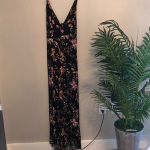 American Eagle Floral Jumpsuit with adjustable straps.